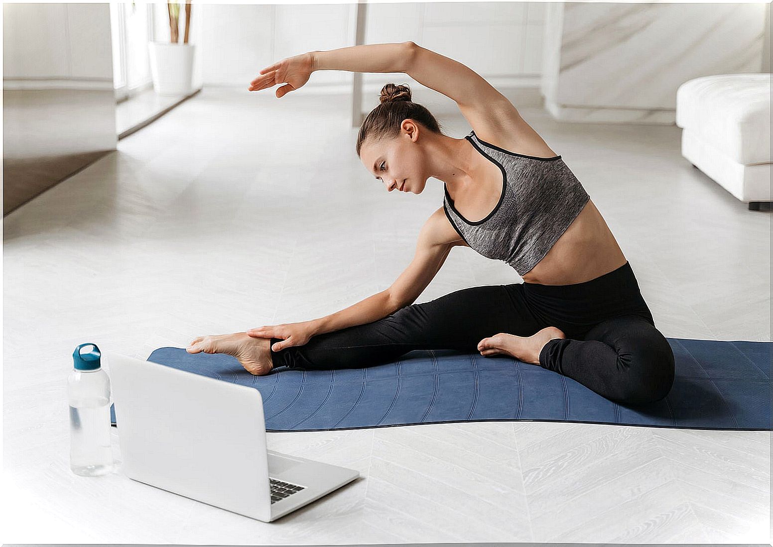 Stretching on yoga blanket