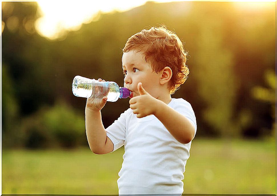 Child drinking water.