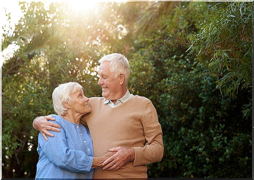 Older couple hugging