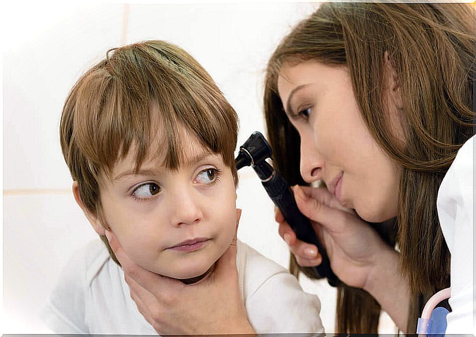 Doctor Observing Child's Ear: Baby's Ear Infection