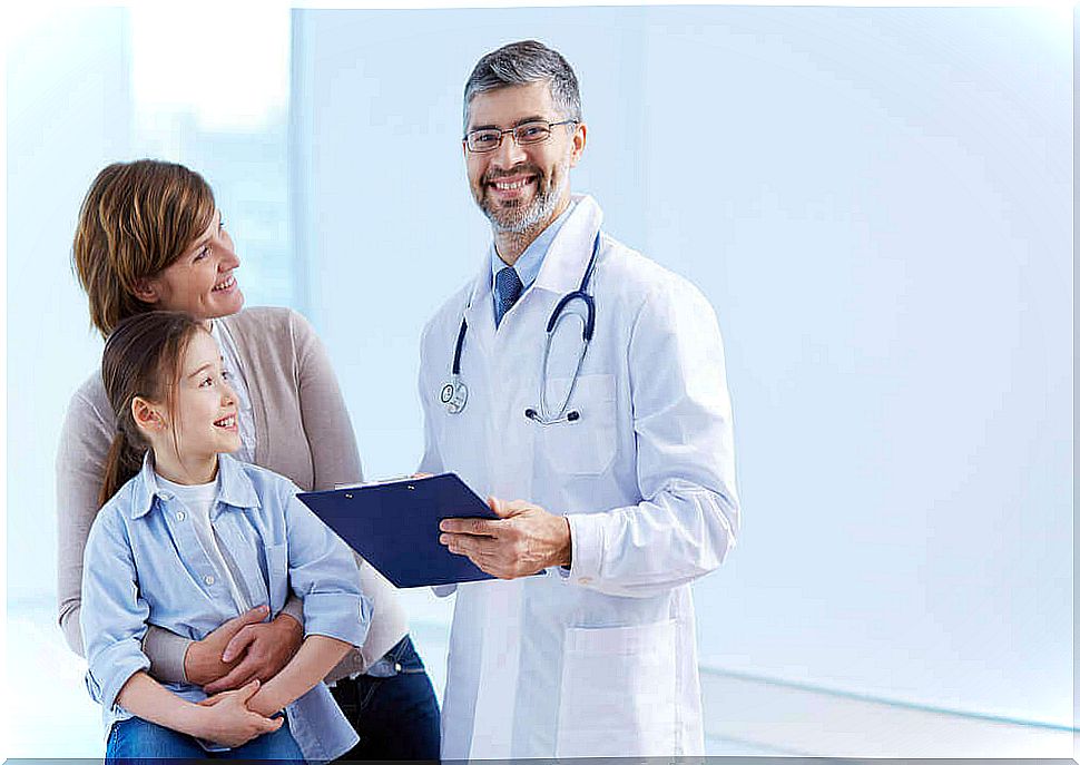 Doctor and mother with their daughter